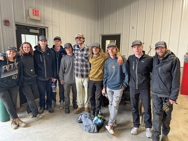 Group of young employees at Lake Geneva Country Club posing for a group photo