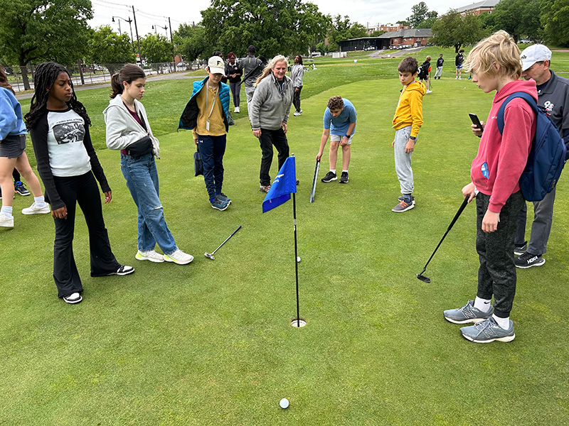 Students at Langston Golf Course during 2023's First Green event at National Golf Day.