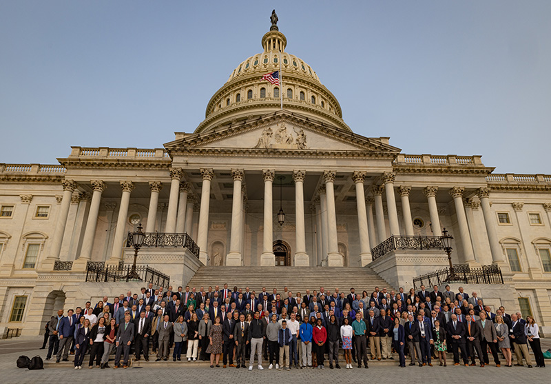 Group photo of GCSAA members at National Golf Day 2023 on the capitol steps