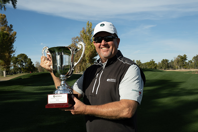 Seth Strickland with his GCSAA Golf Championships trophy