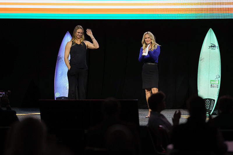 Paige Alms and Lauren Thompson on the GCSAA stage