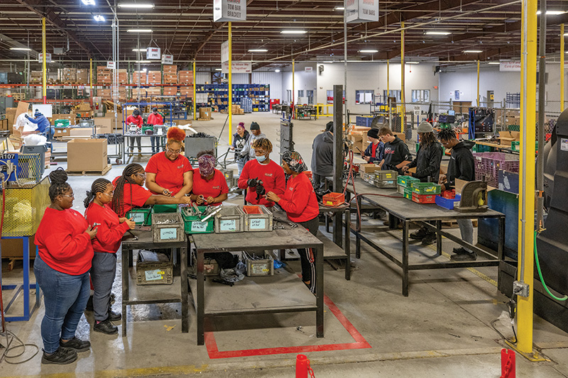 Students working at Textron