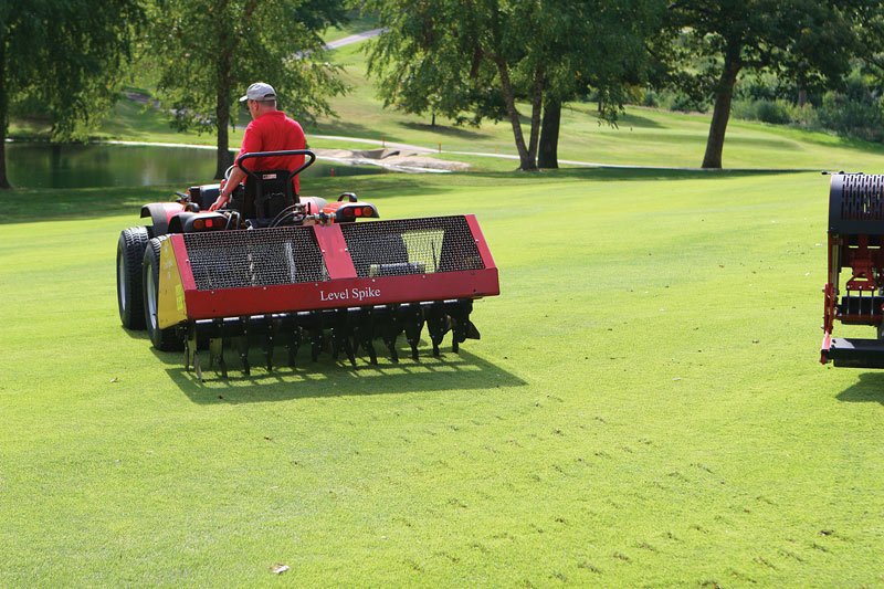 Turfgrass aerification