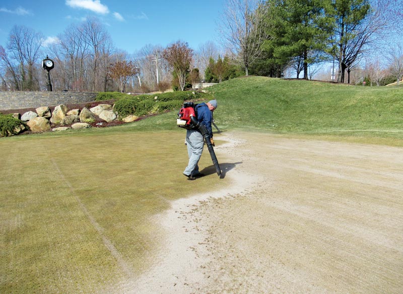 Timing golf course aerification Aerification holes sand