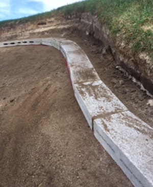 Bunker edges: Inverted-sod technique Bunker concrete block edge