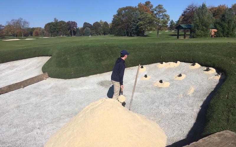 Bunker edges: Inverted-sod technique Bunker sand installation