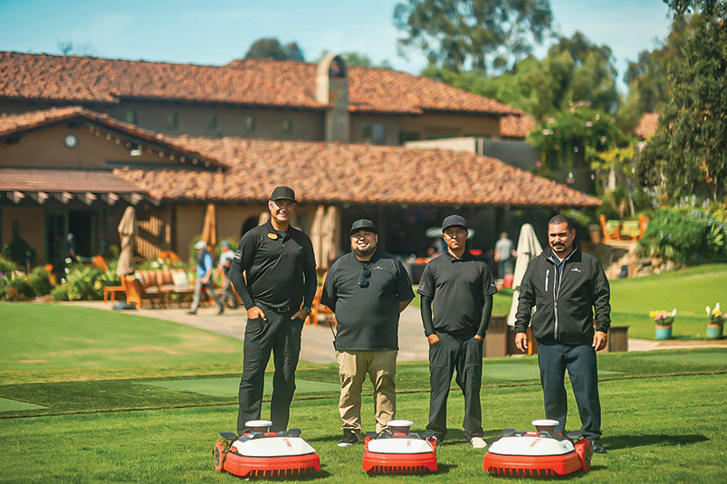Jeff Miller, Tommy Caranci, Abel Sixtos and Sal Soto at the Santaluz Club with autonomous mowers