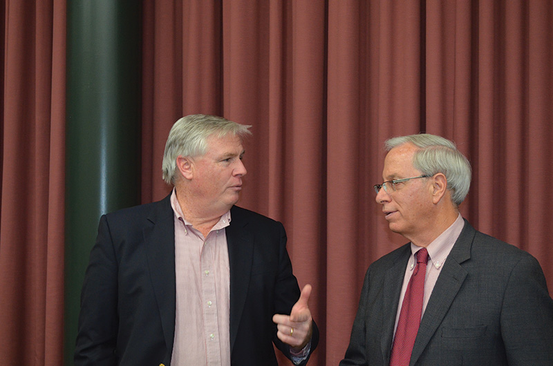 Chris Carson and Bruce Clarke at a conference