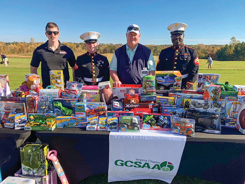 Marines and members of VGCSA at a Toys for Tots donation table
