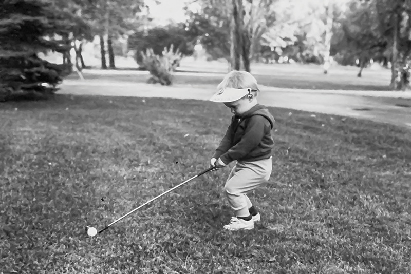 Black and white childhood photo of Ryan Holmes