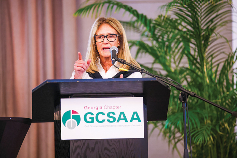 Tenia Workman speaking at a Georgia GCSA event