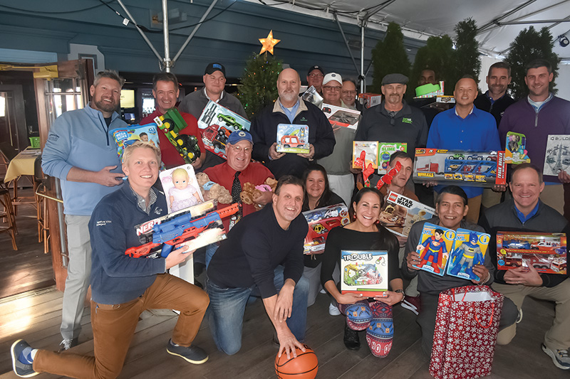 Bill Murray and a group of GCSANJ members during a Toys for Tots drive