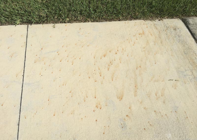 What not to do when removing rust stains from concrete with a pressure washer.