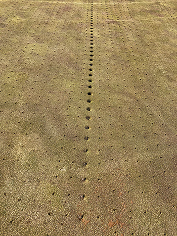 indentations on putting green